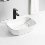 Keramische ovale opbouw waskom Oval Mini Calacatta 46x33cm wit marmer